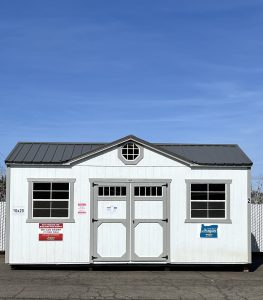 Old Hickory Side Utility Shed with gable dormer, double barn doors and windows on US dealer sales lot